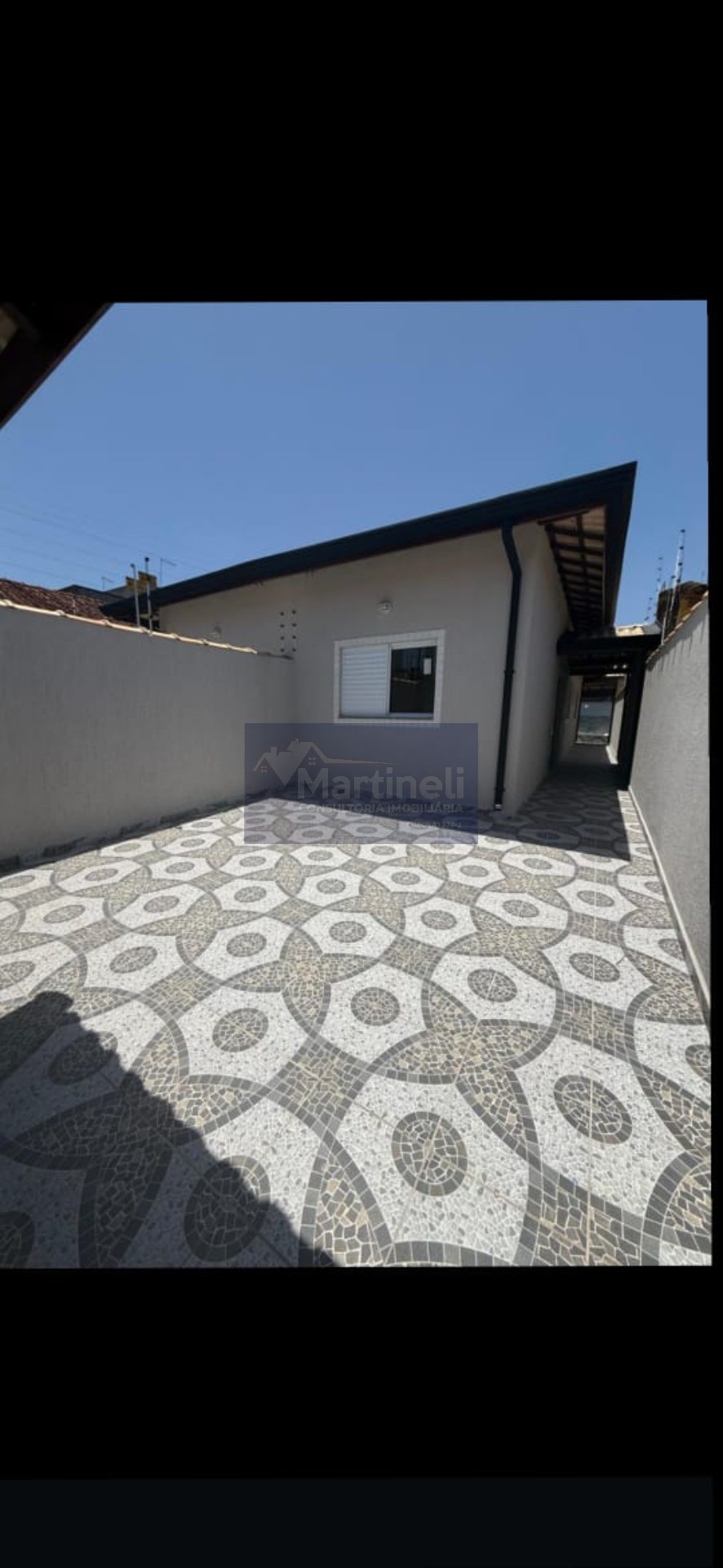 Casa à venda em Itanhaém-SP, bairro Santa Julia: 2 quartos, 1 suíte, 2 vagas de garagem, 67,25m² de área.