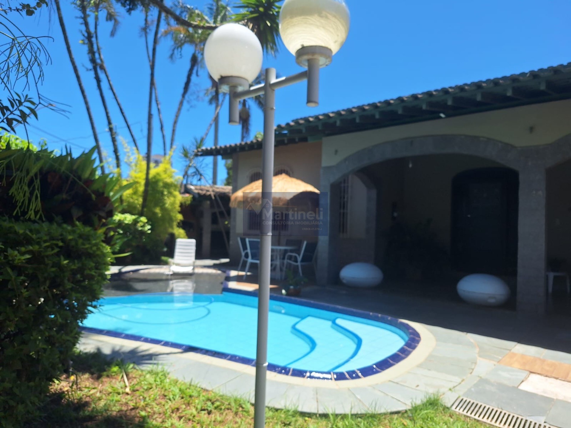 Imperdível casa à venda em Praia Grande-SP, no Jd. Mathilde: 2 quartos, 2 suítes, 5 vagas de garagem e 450m²!